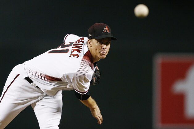 Arizona Diamondbacks' Zack Greinke warms up during the first inning of a baseball game against the Colorado Rockies Monday, Sept. 11, 2017, in Phoenix. The Rockies defeated the Diamondbacks 5-4. (AP Photo/Ross D. Franklin)