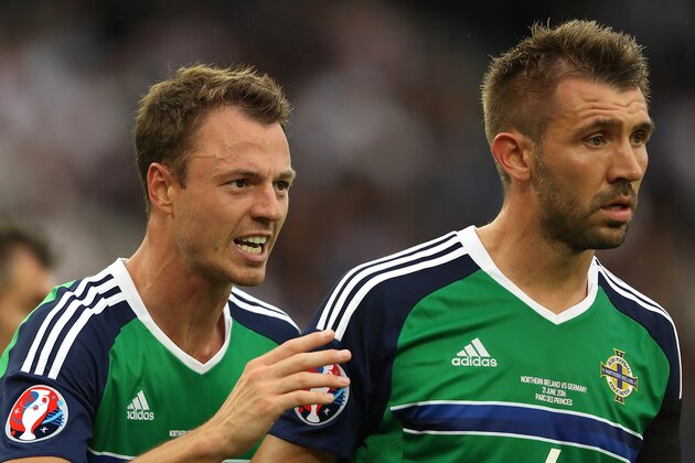 PARIS, FRANCE - JUNE 21: Jonny Evans (L) and Gareth McAuley of Northern Ireland react during the UEFA EURO 2016 Group C match between Northern Ireland and Germany at Parc des Princes on June 21, 2016 in Paris, France. (Photo by Matthew Ashton - AMA/Getty Images) PARIS, FRANCE - JUNE 21: Jonny Evans (L) and Gareth McAuley of Northern Ireland react during the UEFA EURO 2016 Group C match between Northern Ireland and Germany at Parc des Princes on June 21, 2016 in Paris, France. (Photo by Matthew Ashton - AMA/Getty Images)