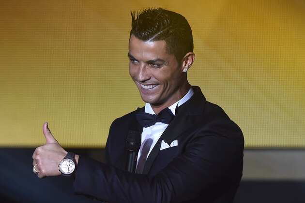 Real Madrid and Portugal's forward  Cristiano Ronaldo gestures on stage during the 2015 FIFA Ballon d'Or award ceremony at the Kongresshaus in Zurich on January 11, 2016. AFP PHOTO / OLIVIER MORIN / AFP / OLIVIER MORIN        (Photo credit should read OLIVIER MORIN/AFP/Getty Images)