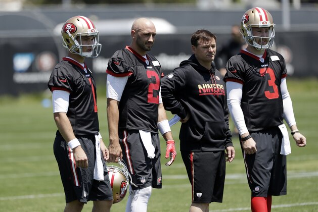 San Francisco 49ers quarterbacks Nick Mullen, left, Brian Hoyer (2) and C.J. Beathard (3) during the team's organized team activity at its NFL football training facility Tuesday, May 23, 2017, in Santa Clara, Calif. (AP Photo/Marcio Jose Sanchez)