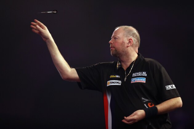 LONDON, ENGLAND - JANUARY 01:  Raymond van Barneveld of The Netherlands throws against Michael van Gerwen of The Netherlands on day fourteen of the 2017 William Hill PDC World Darts Championships at Alexandra Palace on January 1, 2017 in London, England.  (Photo by Bryn Lennon/Getty Images)