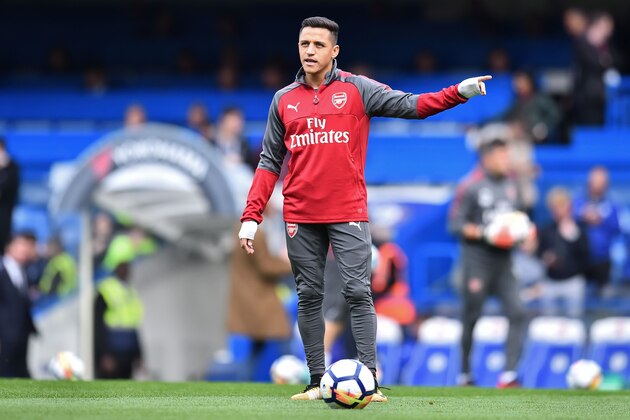 Arsenal's Chilean striker Alexis Sanchez warms up ahead of the English Premier League football match between Chelsea and Arsenal at Stamford Bridge in London on September 17, 2017. / AFP PHOTO / Glyn KIRK / RESTRICTED TO EDITORIAL USE. No use with unauthorized audio, video, data, fixture lists, club/league logos or 'live' services. Online in-match use limited to 75 images, no video emulation. No use in betting, games or single club/league/player publications. / (Photo credit should read GLYN KIRK/AFP/Getty Images) Arsenal's Chilean striker Alexis Sanchez warms up ahead of the English Premier League football match between Chelsea and Arsenal at Stamford Bridge in London on September 17, 2017. / AFP PHOTO / Glyn KIRK / RESTRICTED TO EDITORIAL USE. No use with unauthorized audio, video, data, fixture lists, club/league logos or 'live' services. Online in-match use limited to 75 images, no video emulation. No use in betting, games or single club/league/player publications. / (Photo credit should read GLYN KIRK/AFP/Getty Images)