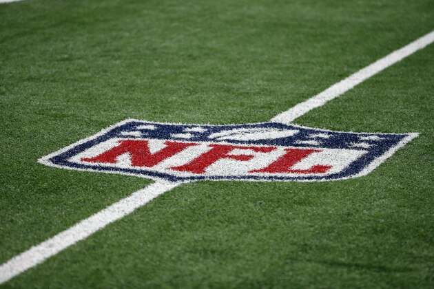An NFL logo displayed on the field is shown before an NFL football game between the Los Angeles Rams and Dallas Cowboys on Sunday, Oct. 1, 2017, in Arlington, Texas. (AP Photo/Michael Ainsworth)
