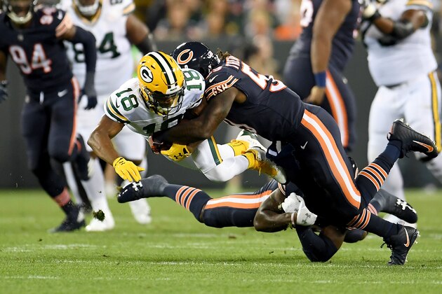 GREEN BAY, WI - SEPTEMBER 28:  Randall Cobb #18 of the Green Bay Packers is tackled by Danny Trevathan #59 of the Chicago Bears in the first quarter at Lambeau Field on September 28, 2017 in Green Bay, Wisconsin. (Photo by Stacy Revere/Getty Images)