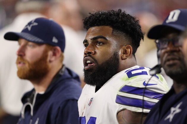 GLENDALE, AZ - SEPTEMBER 25:  Running back Ezekiel Elliott #21 of the Dallas Cowboys watches from the sidelines during the NFL game against the Arizona Cardinals at the University of Phoenix Stadium on September 25, 2017 in Glendale, Arizona.  (Photo by Christian Petersen/Getty Images)