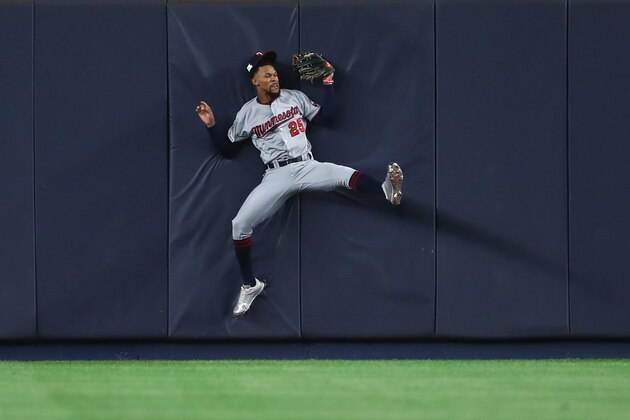 NEW YORK, NY - OCTOBER 03:  Byron Buxton #25 of the Minnesota Twins hits the wall as he catches a pop up fly against the New York Yankees during the second inning  in the American League Wild Card Game at Yankee Stadium on October 3, 2017 in the Bronx borough of New York City.  (Photo by Al Bello/Getty Images)