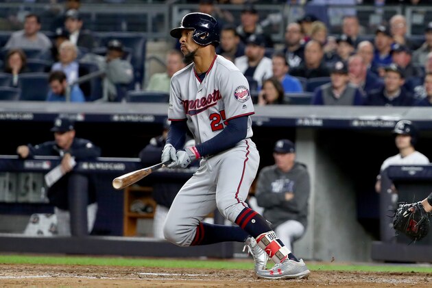 NEW YORK, NY - OCTOBER 03:  Byron Buxton #25 of the Minnesota Twins hits a single to Didi Gregorius #18 of the New York Yankees to score Jorge Polanco #11 during the third inning in the American League Wild Card Game at Yankee Stadium on October 3, 2017 in the Bronx borough of New York City.  (Photo by Al Bello/Getty Images)