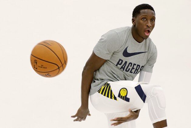 Indiana Pacers' Victor Oladipo poses for photos during the NBA basketball team media day, Monday, Sept. 25, 2017, in Indianapolis. (AP Photo/Darron Cummings)