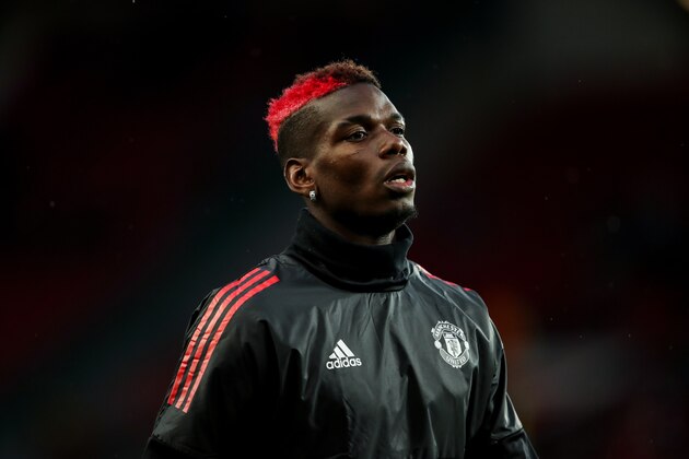 MANCHESTER, ENGLAND - SEPTEMBER 12: Paul Pogba of Manchester United warms up during the UEFA Champions League match between Manchester United and FC Basel at Old Trafford on September 12, 2017 in Manchester, England. (Photo by Robbie Jay Barratt - AMA/Getty Images)