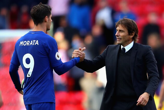 STOKE ON TRENT, ENGLAND - SEPTEMBER 23:  Alvaro Morata of Chelsea is congratulated his team's 4-0 victory and his hat trick by manager Antonio Conte after the Premier League match between Stoke City and Chelsea at Bet365 Stadium on September 23, 2017 in Stoke on Trent, England.  (Photo by Richard Heathcote/Getty Images)