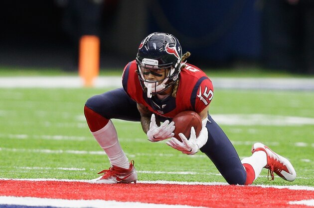 HOUSTON, TX - DECEMBER 18: Will Fuller #15 of the Houston Texans goes low to handle the punt against the Jacksonville Jaguars at NRG Stadium on December 18, 2016 in Houston, Texas.  (Photo by Bob Levey/Getty Images)