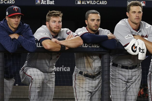 Minnesota Twins players watch during the closing innings of their 8-4 loss in an American League wild-card playoff baseball game against the New York Yankees in New York, Tuesday, Oct. 3, 2017. (AP Photo/Kathy Willens)