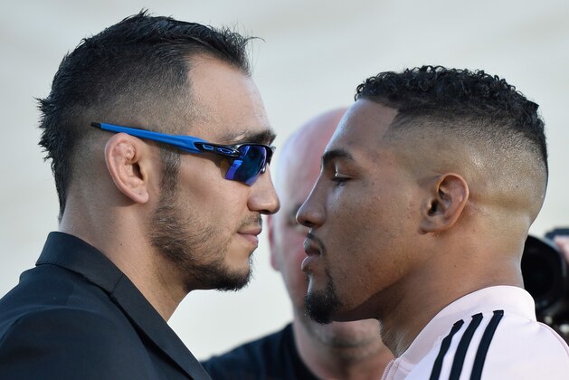 LAS VEGAS, NV - AUGUST 24:   (L-R) Opponents Tony Ferguson and Kevin Lee face off during the UFC 215 & UFC 216 Title Bout Participants Las Vegas Media Day at the UFC Headquarters on August 24, 2017 in Las Vegas, Nevada. (Photo by Brandon Magnus/Zuffa LLC/Zuffa LLC via Getty Images)