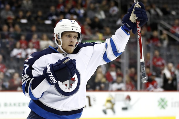 Winnipeg Jets left wing Nikolaj Ehlers, of Denmark, celebrates after scoring a goal on the New Jersey Devils during the first period of an NHL game, Tuesday, March 28, 2017, in Newark, N.J. (AP Photo/Julio Cortez)