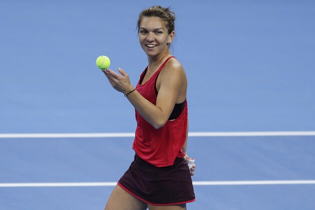 BEIJING, CHINA - OCTOBER 04:  Simona Halep of Romania celebrates her win over Maria Sharapova of Russia during the women's singles third round on day five of 2017 China Open at the China National Tennis Centre on October 4, 2017 in Beijing, China.  (Photo by XIN LI/Getty Images)