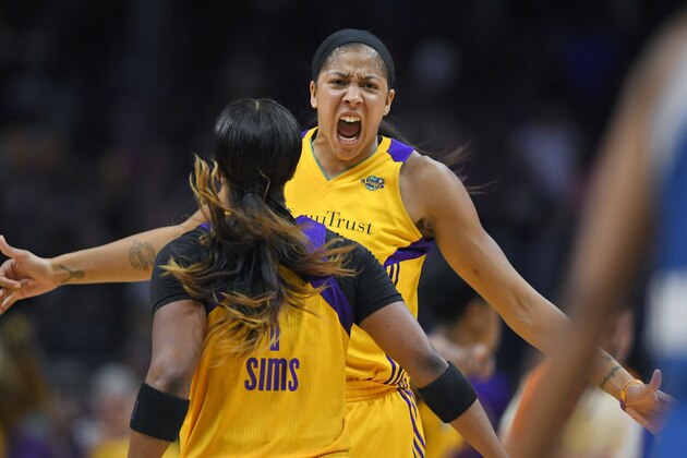 Los Angeles Sparks forward Candace Parker, right, celebrates with guard Odyssey Sims after the Minnesota Lynx turned over the ball during the second half in Game 3 of the WNBA basketball finals Friday, Sept. 29, 2017, in Los Angeles. (AP Photo/Mark J. Terrill)