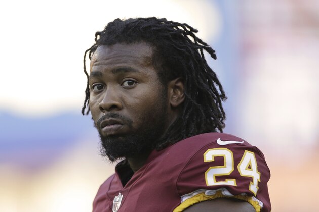 Washington Redskins cornerback Josh Norman (24) looks across the field before an NFL preseason football game against the Green Bay Packers in Landover, Md., Saturday, Aug. 19, 2017. (AP Photo/Mark Tenally)