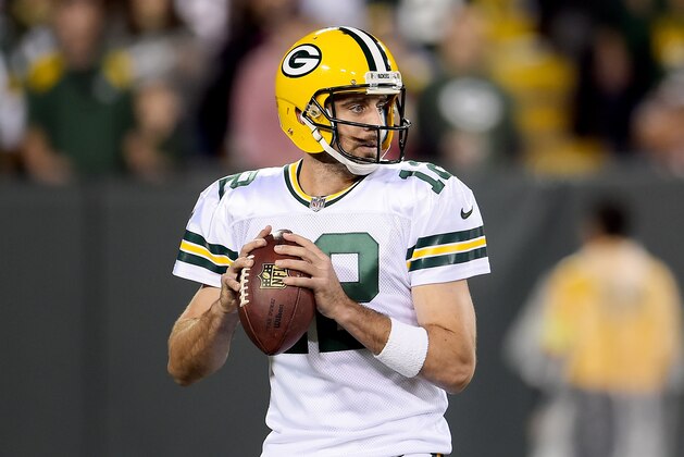 GREEN BAY, WI - SEPTEMBER 28:  Aaron Rodgers #12 of the Green Bay Packers drops back to pass in the second quarter against the Chicago Bears at Lambeau Field on September 28, 2017 in Green Bay, Wisconsin. (Photo by Stacy Revere/Getty Images)