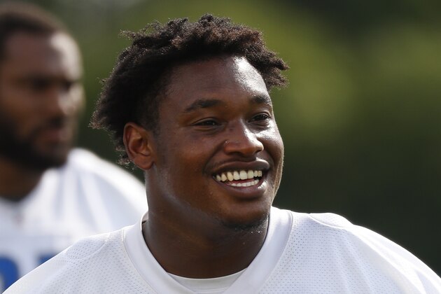 Detroit Lions defensive tackle Akeem Spence (97) watches during NFL football training camp in Allen Park, Mich., Sunday, July 30, 2017. (AP Photo/Paul Sancya)