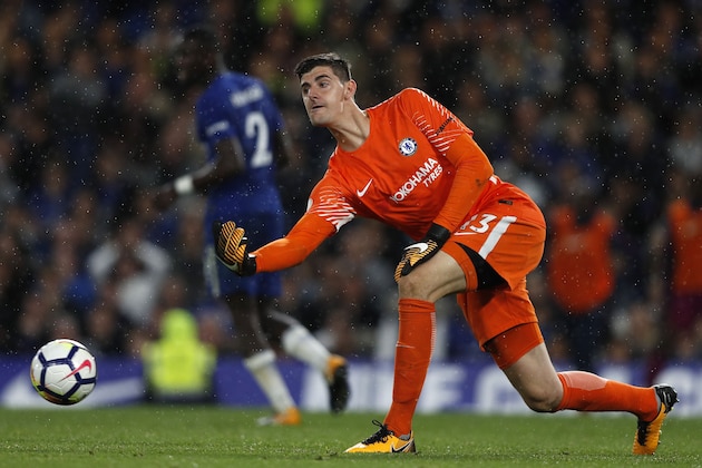 Chelsea's Belgian goalkeeper Thibaut Courtois rolls the ball out during the English Premier League football match between Chelsea and Manchester City at Stamford Bridge in London on September 30, 2017. / AFP PHOTO / Adrian DENNIS / RESTRICTED TO EDITORIAL USE. No use with unauthorized audio, video, data, fixture lists, club/league logos or 'live' services. Online in-match use limited to 75 images, no video emulation. No use in betting, games or single club/league/player publications.  /         (Photo credit should read ADRIAN DENNIS/AFP/Getty Images)