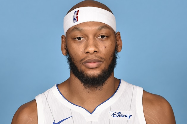 ORLANDO, FL - SEPTEMBER 25:  Adreian Payne #33 of the Orlando Magic poses for a head shot during media day on September 25, 2017 at Amway Center in Orlando, Florida. NOTE TO USER: User expressly acknowledges and agrees that, by downloading and or using this photograph, User is consenting to the terms and conditions of the Getty Images License Agreement. Mandatory Copyright Notice: Copyright 2017 NBAE (Photo by Gary Bassing/NBAE via Getty Images)
