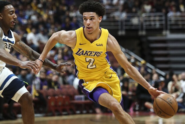 Los Angeles Lakers guard Lonzo Ball, right, drives against Minnesota Timberwolves guard Jeff Teague during the first half of an NBA preseason basketball game in Anaheim, Calif., Saturday, Sept. 30, 2017. (AP Photo/Ringo H.W. Chiu) Los Angeles Lakers guard Lonzo Ball, right, drives against Minnesota Timberwolves guard Jeff Teague during the first half of an NBA preseason basketball game in Anaheim, Calif., Saturday, Sept. 30, 2017. (AP Photo/Ringo H.W. Chiu)