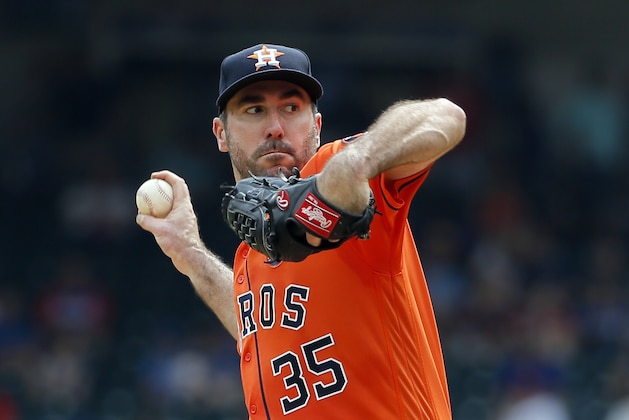 FILE - In this Sept. 27, 2017, file photo, Houston Astros starting pitcher Justin Verlander winds up to throw to the Texas Rangers during a baseball game in Arlington, Texas. The Astros will start Verlander in Game 1 of the AL Division Series against Chris Sale and the Boston Red Sox on Thursday, Oct 5. Manager A.J. Hinch announced the decision Tuesday, adding that left-hander Dallas Keuchel, who won the AL Cy Young Award in 2015, will start Game 2 on Friday against Drew Pomeranz. (AP Photo/Tony Gutierrez, File)