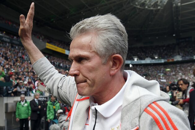 Bayern head coach Jupp Heynckes waves to supporters prior to his last German first division Bundesliga soccer match between VfL Borussia Moenchengladbach  and Bayern Munich in Moenchengladbach, Germany, Saturday, May 18, 2013. Heynckes started his career in Moenchengladbach. (AP Photo/Frank Augstein)