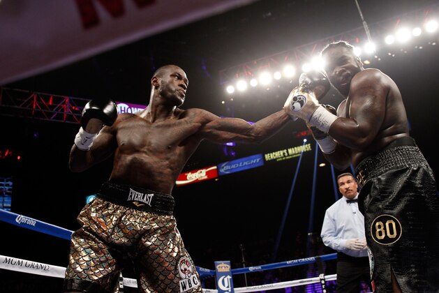 LAS VEGAS, NV - JANUARY 17:  Deontay Wilder (L) connects on WBC heavyweight champion Bermane Stiverne during their title fight at the MGM Grand Garden Arena on January 17, 2015 in Las Vegas, Nevada. Wilder took the title by unanimous decision.  (Photo by Steve Marcus/Getty Images)