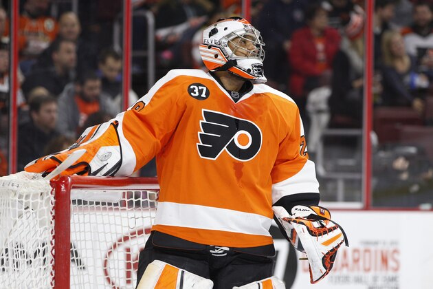 Philadelphia Flyers goalie Ray Emery looks on after giving up a goal during the first period of an NHL hockey game against the Buffalo Sabres, Thursday, Feb. 19, 2015, in Philadelphia. (AP Photo/Chris Szagola)