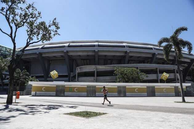 RIO DE JANEIRO, BRAZIL - SEPTEMBER 05:  A man jogs past Maracana stadium, the site of the opening and closing ceremonies of the Rio 2016 Olympic Games, on September 5, 2017 in Rio de Janeiro, Brazil. Federal Police today detained Carlos Arthur Nuzman, head of the Brazil Olympic Committee, during alleged corruption investigations over Rio's bid to host the Olympics.  (Photo by Mario Tama/Getty Images)