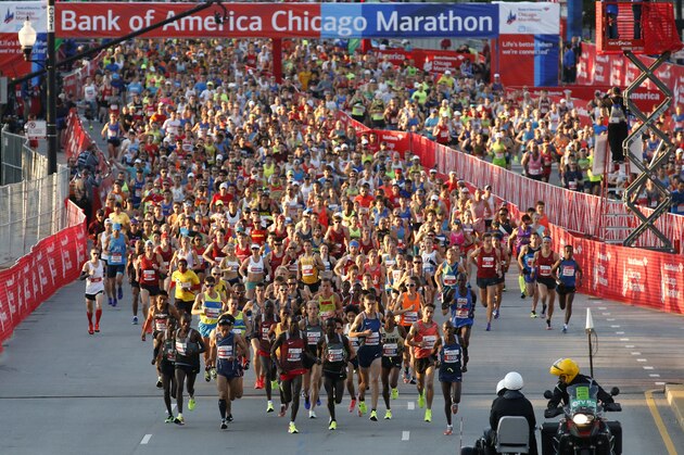 Runners start the Chicago Marathon, Sunday, Oct. 9, 2016, in Chicago. (AP Photo/Nam Y. Huh)