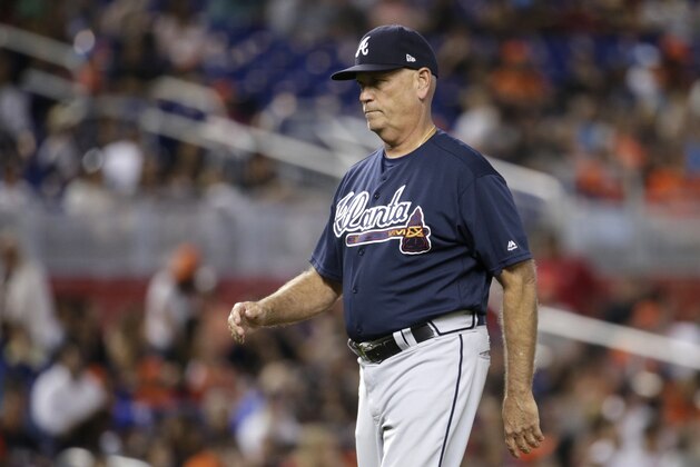 Atlanta Braves manager Brian Snitker walks to the dugout during a baseball game against the Miami Marlins, Sunday, Oct. 1, 2017, in Miami. The Braves won 8-5. (AP Photo/Lynne Sladky)