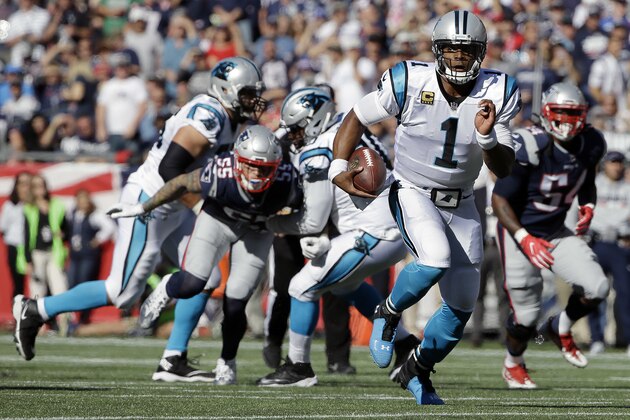 Carolina Panthers quarterback Cam Newton (1) runs for yardage during the second half of an NFL football game against the New England Patriots, Sunday, Oct. 1, 2017, in Foxborough, Mass. (AP Photo/Steven Senne)