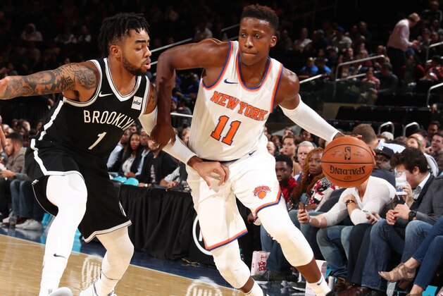 NEW YORK, NY - OCTOBER 3:  Frank Ntilikina #11 of the New York Knicks handles the ball against D'Angelo Russell #1 of the Brooklyn Nets during the preseason game on October 3, 2017 at Madison Square Garden in New York City, New York.  NOTE TO USER: User expressly acknowledges and agrees that, by downloading and or using this photograph, User is consenting to the terms and conditions of the Getty Images License Agreement. Mandatory Copyright Notice: Copyright 2017 NBAE  (Photo by Nathaniel S. Butler/NBAE via Getty Images)