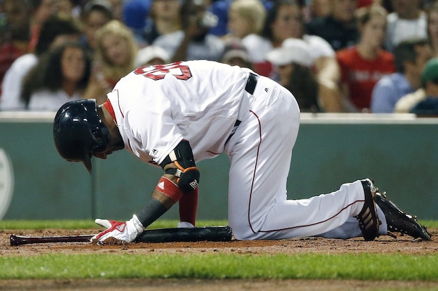 Boston Red Sox's Eduardo Nunez kneels on the ground after fouling off during the third inning of a baseball game against the Toronto Blue Jays in Boston, Monday, Sept. 25, 2017. (AP Photo/Michael Dwyer)