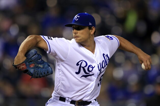 Kansas City Royals starting pitcher Jason Vargas delivers to a Detroit Tigers batter during the first inning of a baseball game at Kauffman Stadium in Kansas City, Mo., Tuesday, Sept. 26, 2017. (AP Photo/Orlin Wagner)