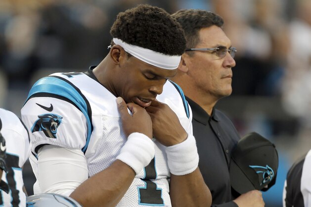 Carolina Panthers' Cam Newton, left, and Carolina Panthers head coach Ron Rivera, right, stand during the National Anthem before an NFL preseason football game against the Pittsburgh Steelers in Charlotte, N.C., Thursday, Aug. 31, 2017. (AP Photo/Bob Leverone) Carolina Panthers' Cam Newton, left, and Carolina Panthers head coach Ron Rivera, right, stand during the National Anthem before an NFL preseason football game against the Pittsburgh Steelers in Charlotte, N.C., Thursday, Aug. 31, 2017. (AP Photo/Bob Leverone)