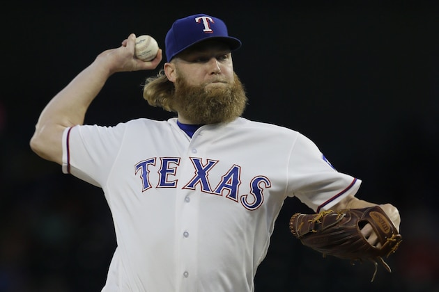 Texas Rangers starting pitcher Andrew Cashner throws during the first inning of a baseball game against the Oakland Athletics in Arlington,Texas, Saturday, Sept. 30, 2017. (AP Photo/LM Otero)