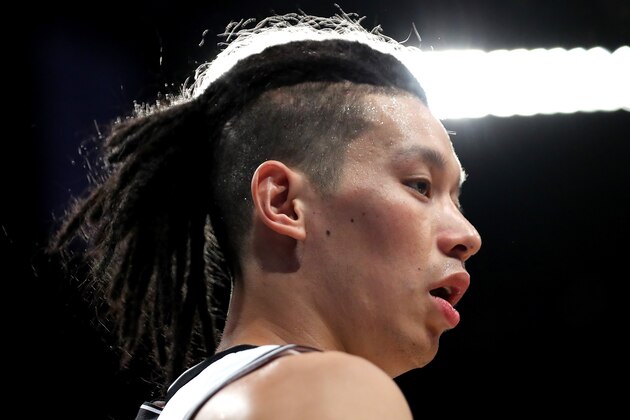 NEW YORK, NY - OCTOBER 05: Jeremy Lin #7 of the Brooklyn Nets looks on in the first half against the Miami Heat during their Pre Season game at Barclays Center on October 5, 2017 in the Brooklyn Borough of New York City.  NOTE TO USER: User expressly acknowledges and agrees that, by downloading and or using this photograph, User is consenting to the terms and conditions of the Getty Images License Agreement.  (Photo by Abbie Parr/Getty Images)