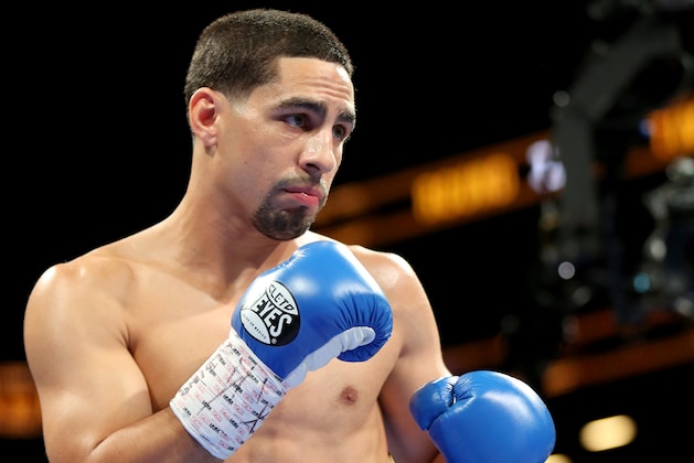 Danny Garcia in action against Paul Malignaggi during their welterweight fight at the Barclays Center in Brooklyn, on Saturday, August 1, 2015. Garcia won via TKO in Round 9.  (AP Photo/Gregory Payan)