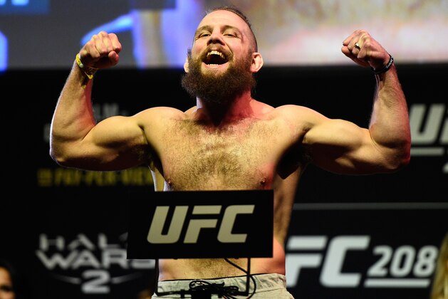 BROOKLYN, NEW YORK - FEBRUARY 10:  Nik Lentz poses on the scale during the UFC 208 weigh-in inside Kings Theater on February 10, 2017 in Brooklyn, New York. (Photo by Jeff Bottari/Zuffa LLC/Zuffa LLC via Getty Images)