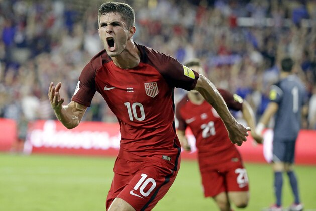 United States' Christian Pulisic (10) celebrates after scoring a goal against Panama during the first half of a World Cup qualifying soccer match, Friday, Oct. 6, 2017, in Orlando, Fla. (AP Photo/John Raoux)