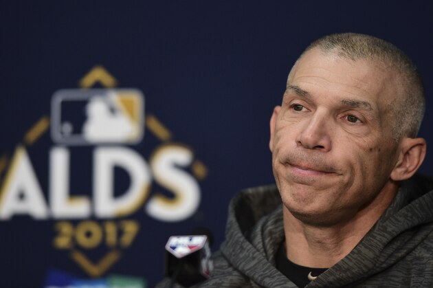 New York Yankees manager Joe Girardi listens to a question during a news conference before Game 2 of baseball's American League Division Series against the Cleveland Indians, Friday, Oct. 6, 2017, in Cleveland. (AP Photo/David Dermer)