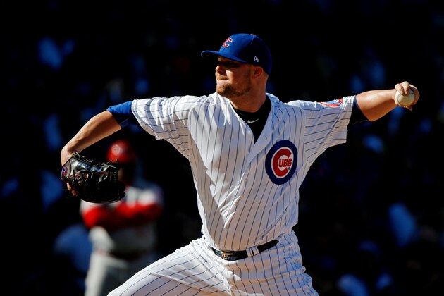 CHICAGO, IL - SEPTEMBER 30: Jon Lester #34 of the Chicago Cubs pitches against the Cincinatti Reds during the first inning at Wrigley Field on September 30, 2017 in Chicago, Illinois.  (Photo by Jon Durr/Getty Images)