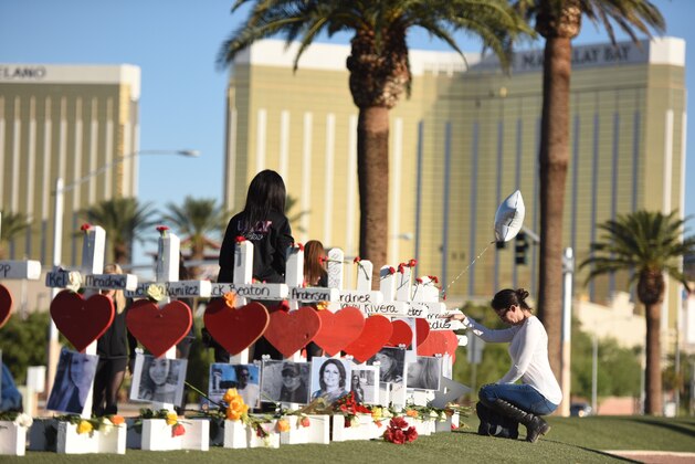 58 white crosses for the victims of Sunday night's mass shooting o the Las Vegas Strip just south of the Mandalay Bay hotel, October 6, 2017 in Las Vegas, Nevada.
On October 1, 2017 Stephen Paddock killed at least 58 people and injured more than 450 after he opened fire on a large crowd at the Route 91 Harvest country music festival. The massacre is one of the deadliest mass shooting events in US history. / AFP PHOTO / Robyn Beck        (Photo credit should read ROBYN BECK/AFP/Getty Images)