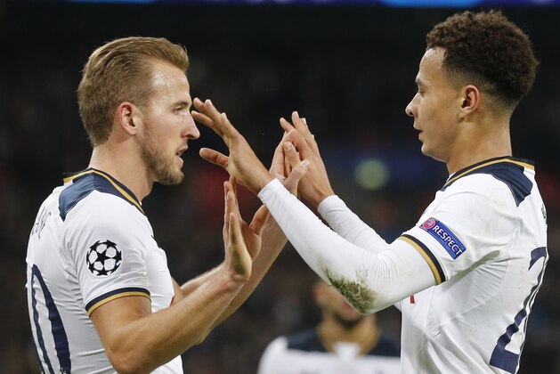 Tottenham's Dele Alli, right, is congratulated by his teammate Harry Kane after scoring his side's 3rd goal past CSKA goalkeeper Igor Akinfeev during the Champions League group E soccer match between Tottenham Hotspur and CSKA Moscow at Wembley stadium in London, Wednesday, Dec. 7, 2016. (AP Photo/Frank Augstein)