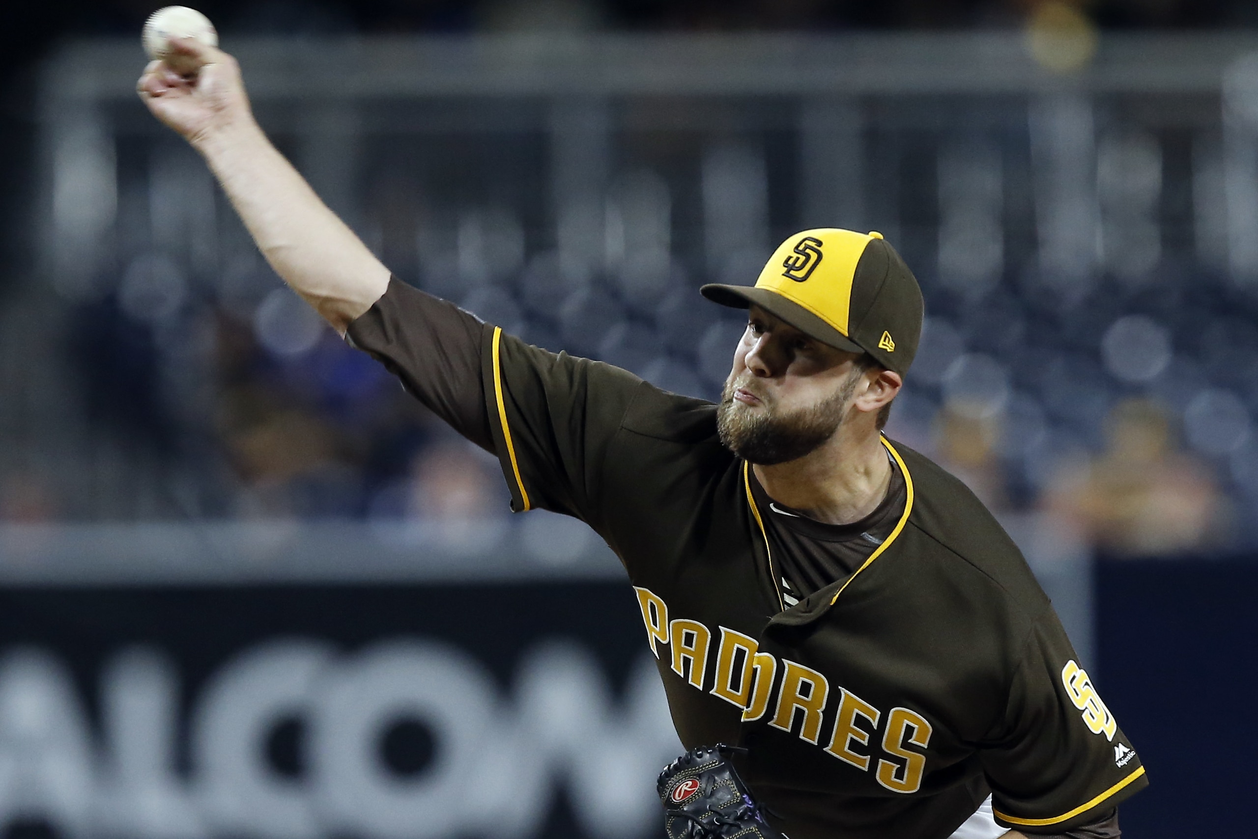 San Diego Padres starting pitcher Jordan Lyles delivers during the first inning of a baseball game against the Colorado Rockies in San Diego, Friday, Sept. 22, 2017. (AP Photo/Alex Gallardo)