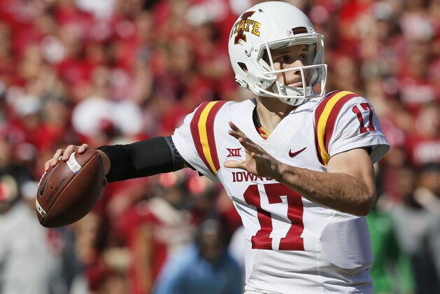 Iowa State quarterback Kyle Kempt (17) passes in the first quarter of an NCAA college football game against Oklahoma in Norman, Okla., Saturday, Oct. 7, 2017. (AP Photo/Sue Ogrocki)