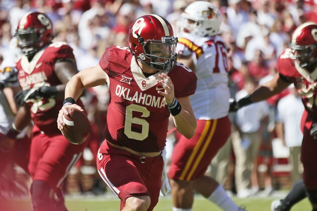 Oklahoma quarterback Baker Mayfield (6) carries for a touchdown in the second quarter of an NCAA college football game against Iowa State in Norman, Okla., Saturday, Oct. 7, 2017. (AP Photo/Sue Ogrocki)